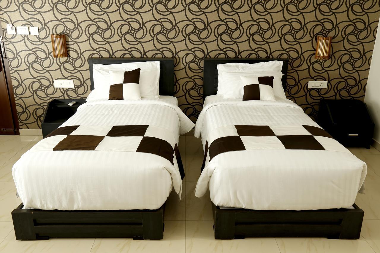 Rydges Inn Kottakkal Zimmer foto